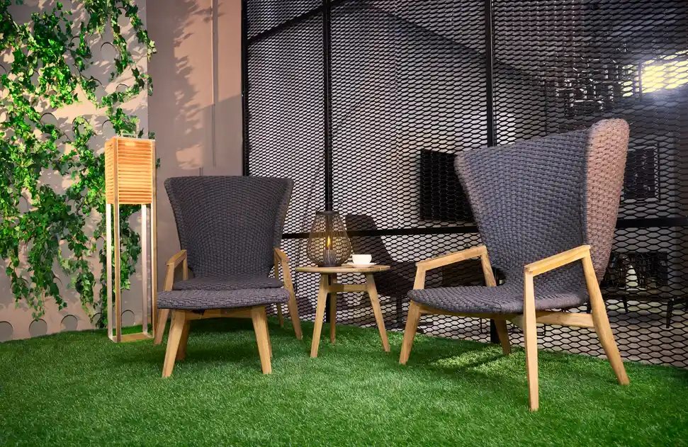 artficial grass balcony with two chairs