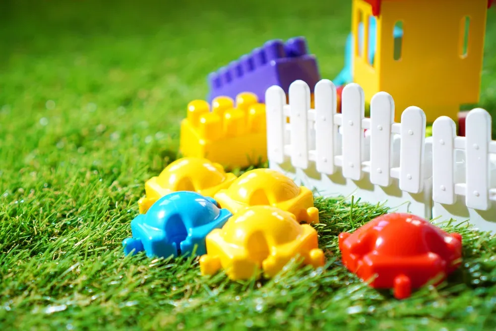 kids playground with toys on artificial turf