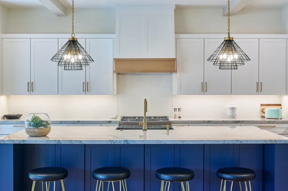 kichen with blue and white cabinetry